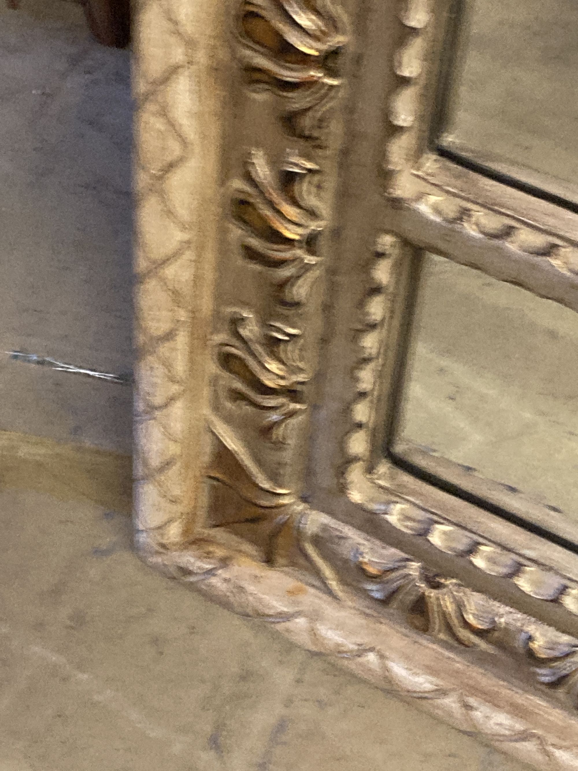 A reproduction parcel gilt arched top wall mirror, width 120cm, height 180cm